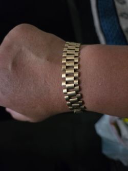 10 k gold Rolex bracelet  wide by 8 3/4