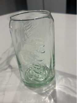 17 matching Coca-Cola can-shaped glasses