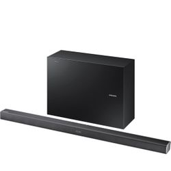 Samsung HW-J550 soundbar and wireless subwoofer.