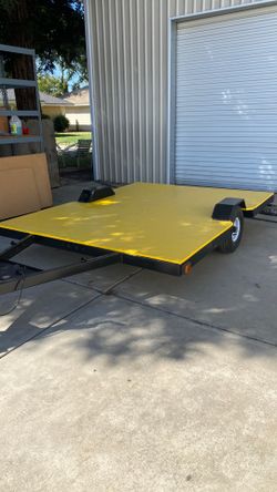 Flatbed trailer used to be tent trailer