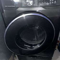Samsung front-load washer & dryer set, dark stainless / black finish, pedestal drawers included