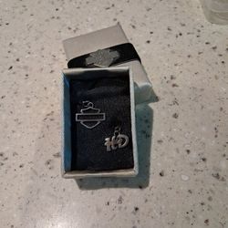 Harley-Davidson shield and HD logo charms in a presentation box