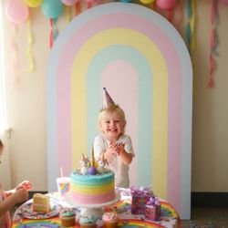 Pastel rainbow arch backdrop