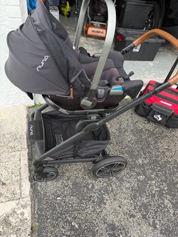 Nuna Baby Stroller with Infant Car Seat. Can be used as they grow.