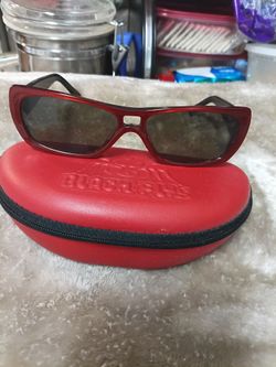 Vintage "Black Flys" sunglasses in candy apple burgundy and black with original tags, case, and cloth.