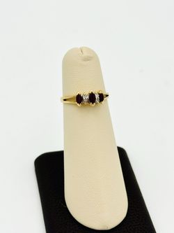 14K YELLOW GOLD 1.87G RED STONE CLEAR STONE RING SIZE 6 USED