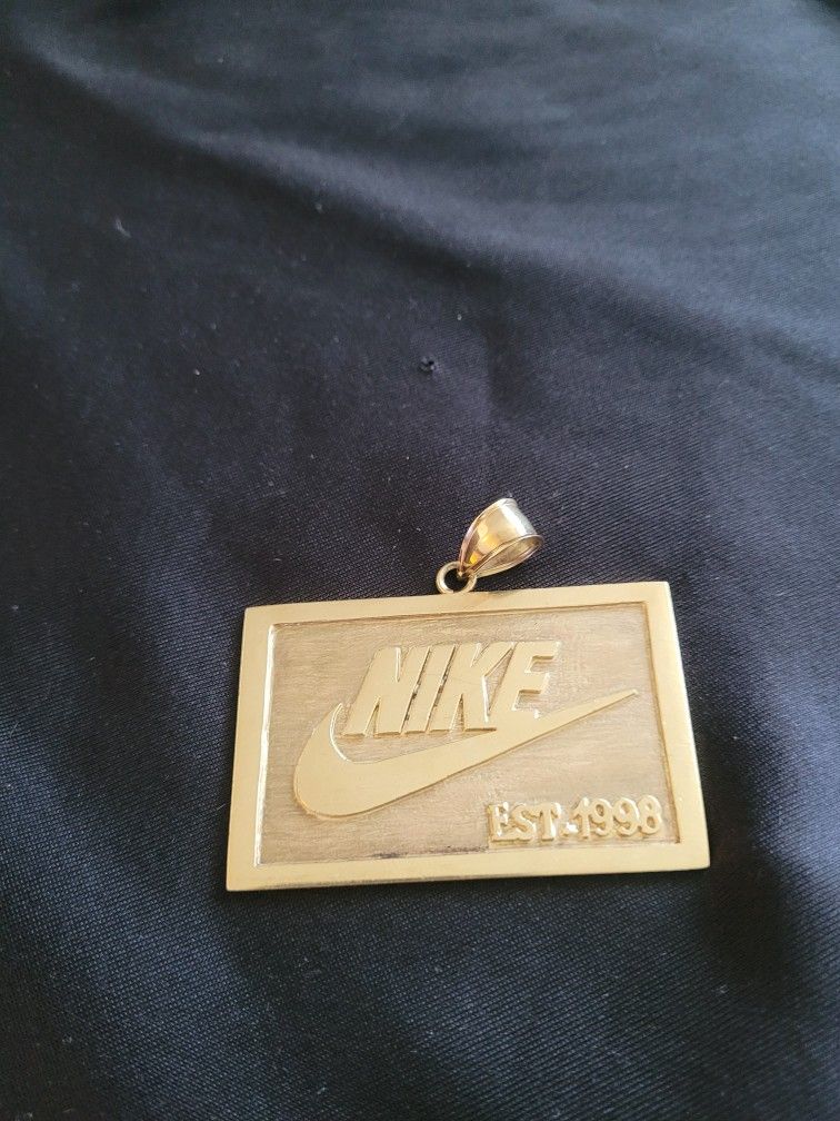 Gold Charm NIKE emblem