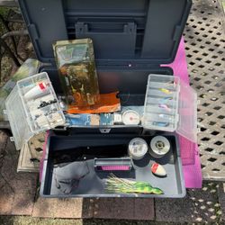 Fishing Tackle Box With Lots Of Fishing Lures And Gear