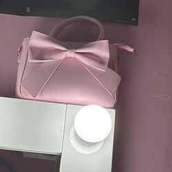 pink lightweight bow purse