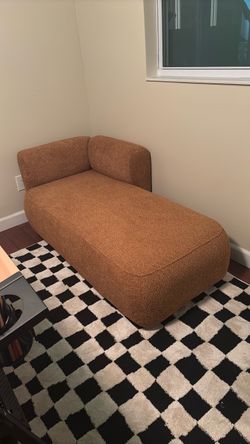 Orange boucle lounger sofa