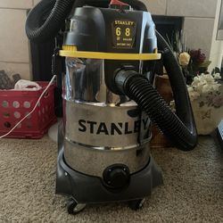 STANLEY WET DRY SHOP VACUUM WITH BRUSHES, ACCESSORIES, ETC.