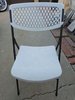 White Plastic Folding Chair with Black Frame