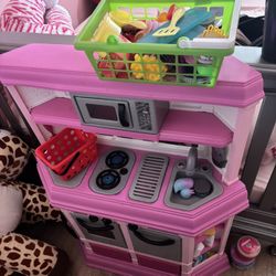 Toy kitchen with toys 
