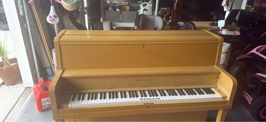 Free- Light-toned wood Kawai upright piano. Must pick up.