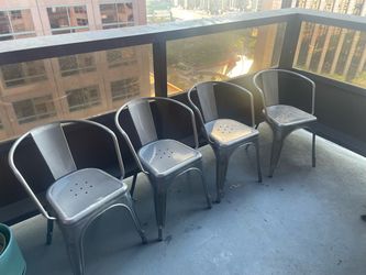 Four Metal Silver Colored Chairs