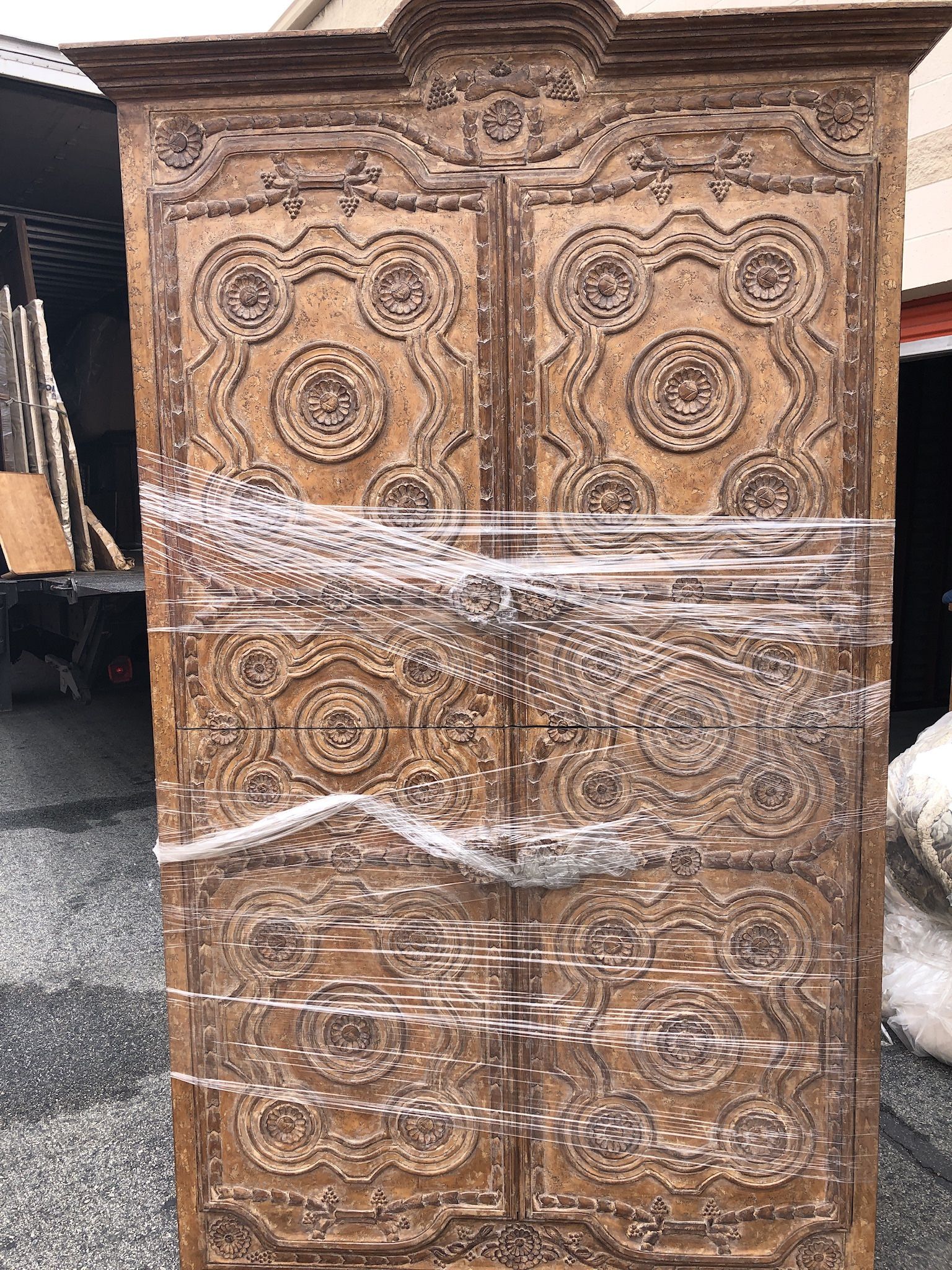 Kreiss Furniture. Carved wood armoire 