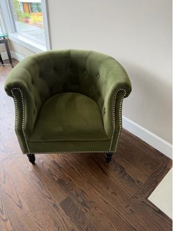 Green velvet armchair