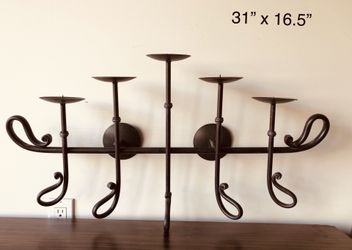 Wall mounted candle holder