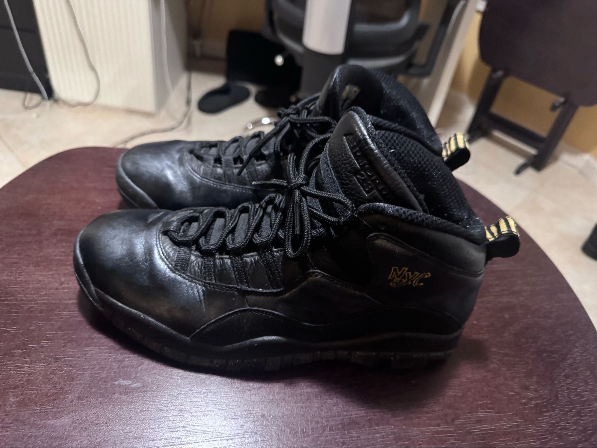 Air Jordan 10 NYC Black Gold Sneakers