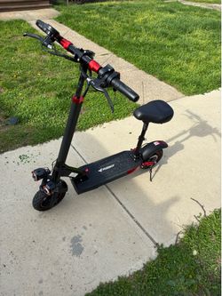 Electric scooter LED lights does about 35 depending on your size fun to ride