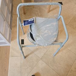 Bed side commode new still in packaging