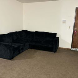 Black Corduroy Sectional With Storage And Pull Out Bed