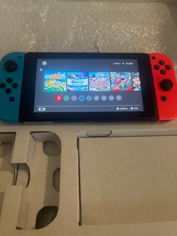 Nintendo Switch Neon Blue/Red  with two games memory card and carrying case