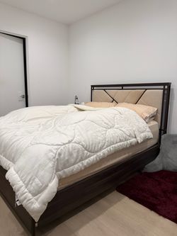 Comfortable queen bed with mattress