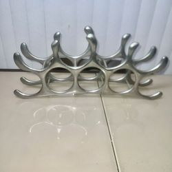 Aluminum MCM 9  Bottle Wine Rack, Vintage. Used in good condition with some cosmetic blemishes. These blemishes are in the form of scratches and scuff
