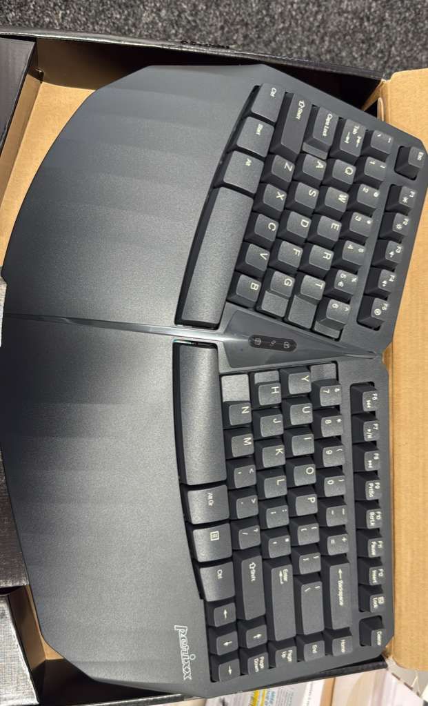 Perixx PERIBOARD-613 wireless mini membrane ergonomic split keyboard.  