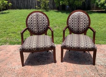 A pair of stylish accent chairs