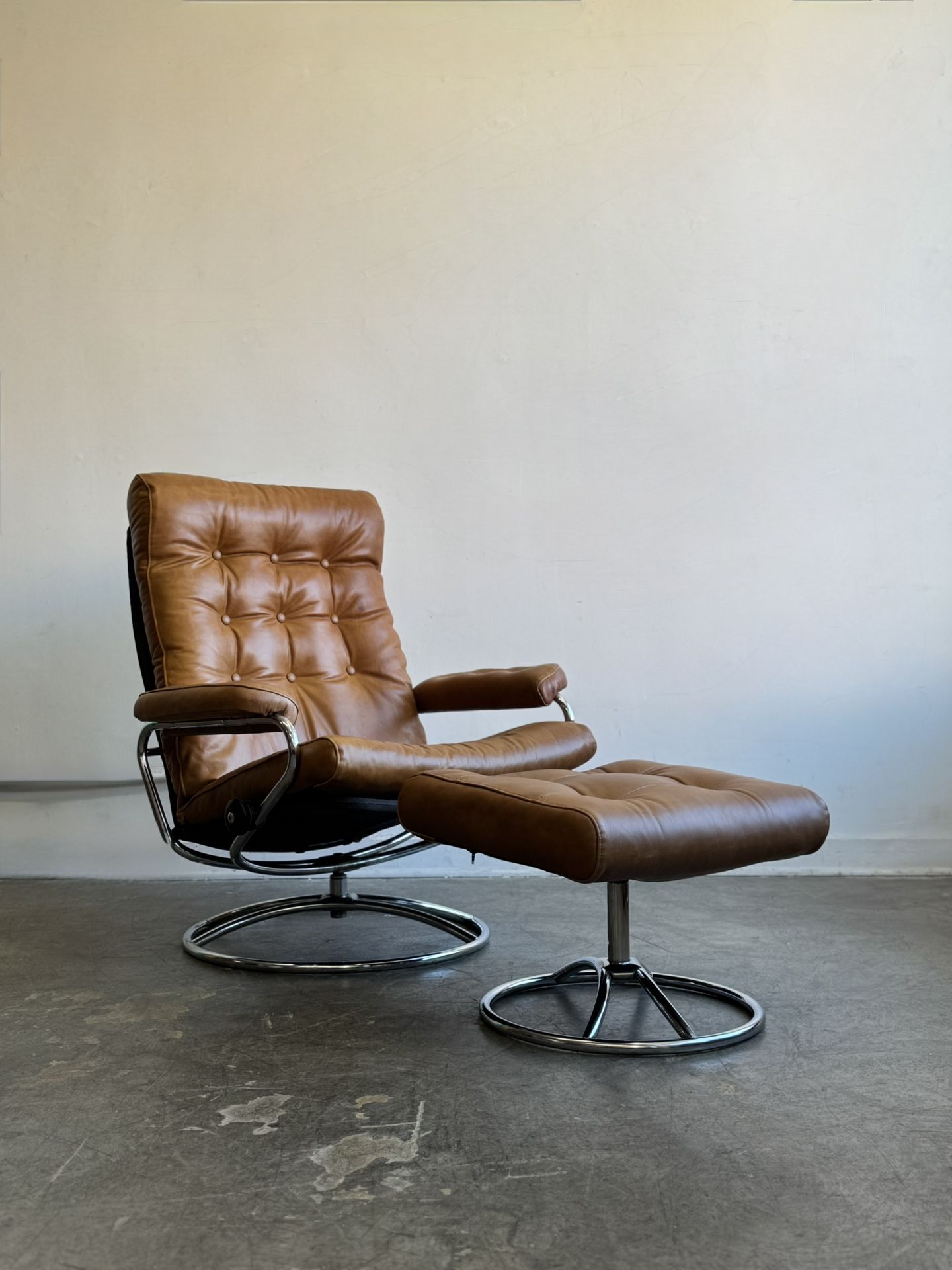 Swedish Ekornes “Stressless” Recliner And Ottoman Set