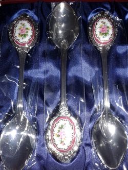 4 tiny decorative spoons