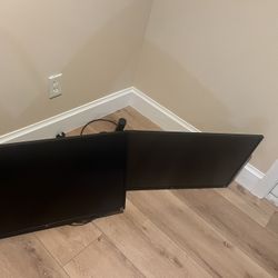 Two 32 inch LG Monitors With brackets And cables