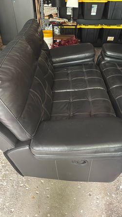 Two couches (black faux leather)