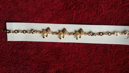 Un set de perlitas/earrings necklace y Pulsera