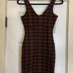 Woman’s plaid dress 