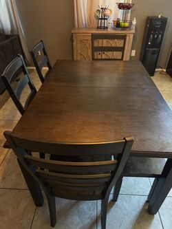 Dark Wood Dining Table with 3 chairs and a bench