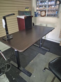 Standing Upright Adjustable Automatic Office Desk Dark Wood Color Multiple Heights