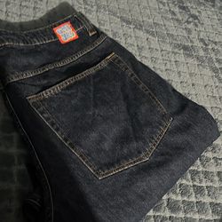 dark blue empyre jeans like new with desings on back pocket