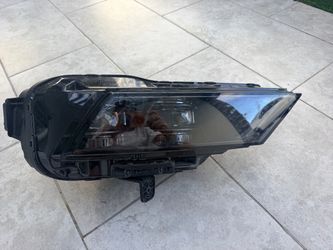2025 OEM passenger side headlight
