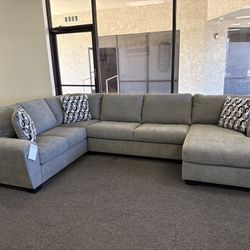 Grey Sectional By Ashley furniture 