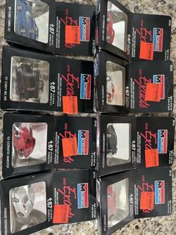 Monogram mini cars lot of 8 NIB. Ferrari corvette etc