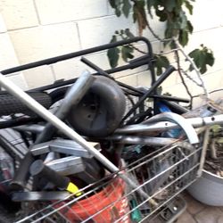 Scrap Metal And Shopping Cart