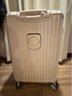 24-inch white hard shell rolling suitcase