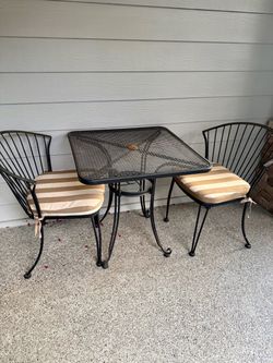 Patio set of table and 2 metal chairs
