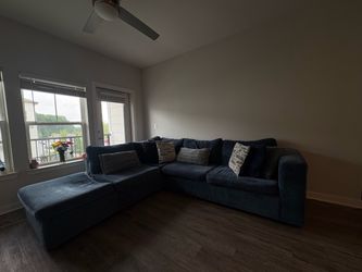 Dark blue sectional sofa with chaise