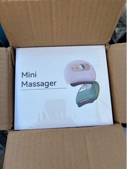 Mini Massager (an electric Gua Sha facial and body massager device)
