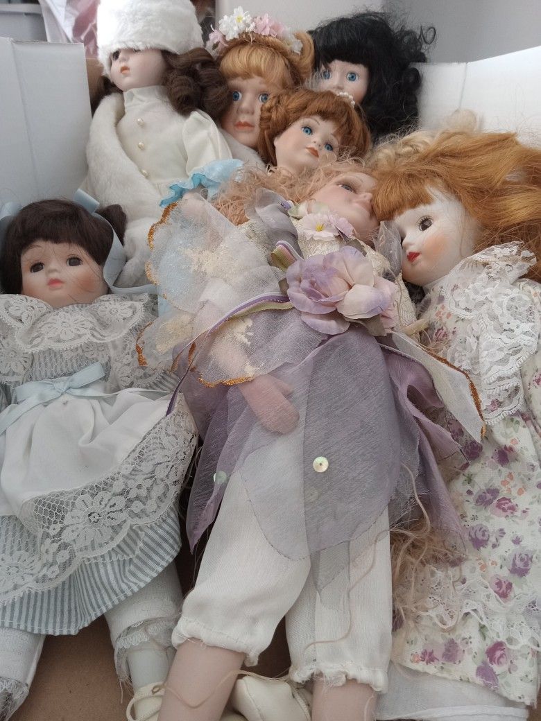 8 Porcelain Dolls