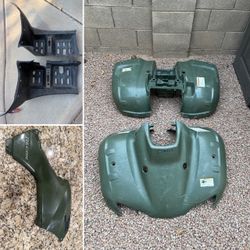 Honda Recon green Plastics. Front and rear fenders side step splash guards tank side cover